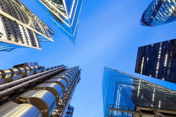 UK, England, London, Blue sky over tall skyscrapers at dusk