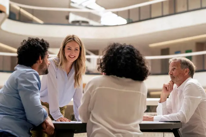 Multiracial business colleagues discussing strategy in meeting