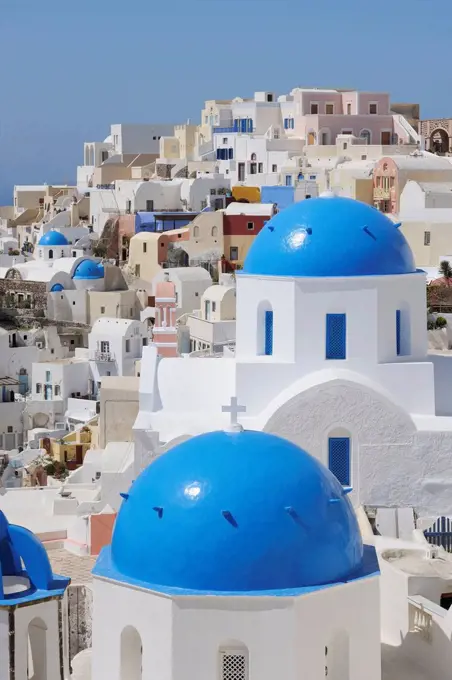 Greece, Santorini, View of classical whitewashed church and bell tower at Oia