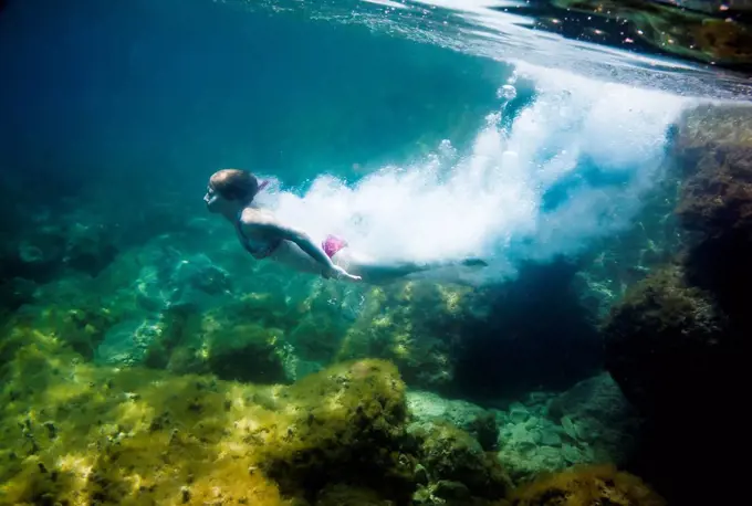 Croatia, Brac, Sumartin, Teenage girl under water