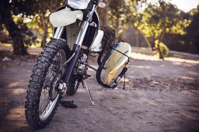 Indonesia, Bali, motorbike with surfboard