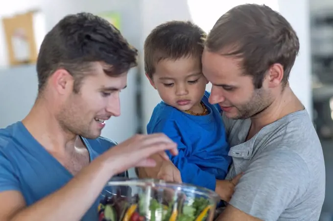 Gay couple with kid