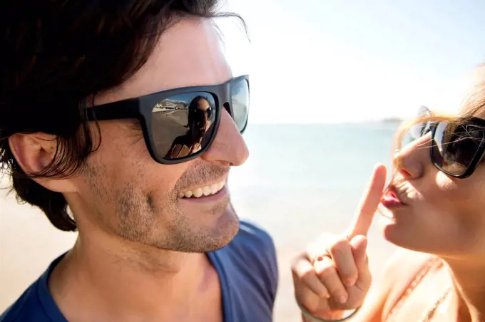 South Africa, portrait of happy couple wearing sunglasses