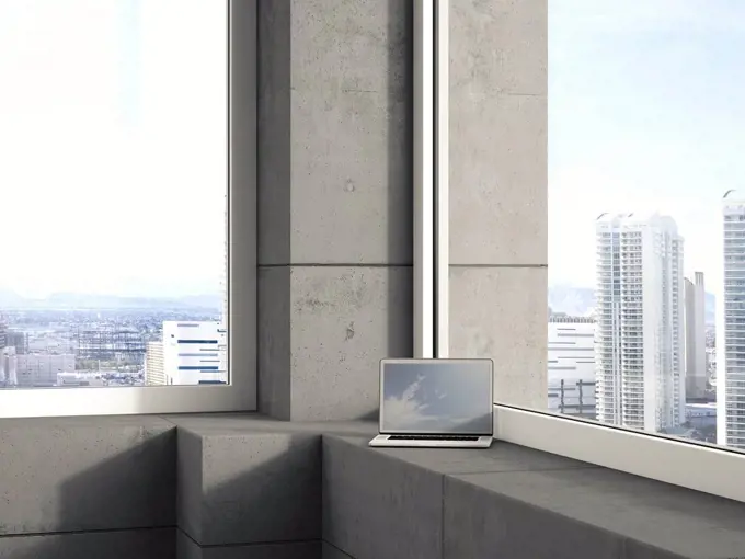 Laptop standing on window sill in a modern high-rise building, 3D Rendering