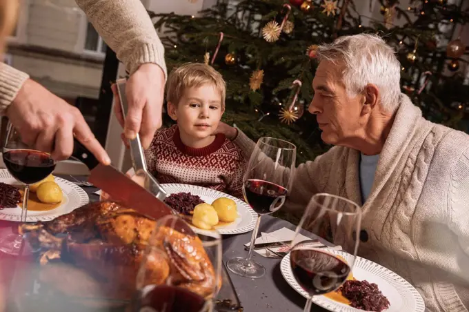 Family Christmas dinner with turkey