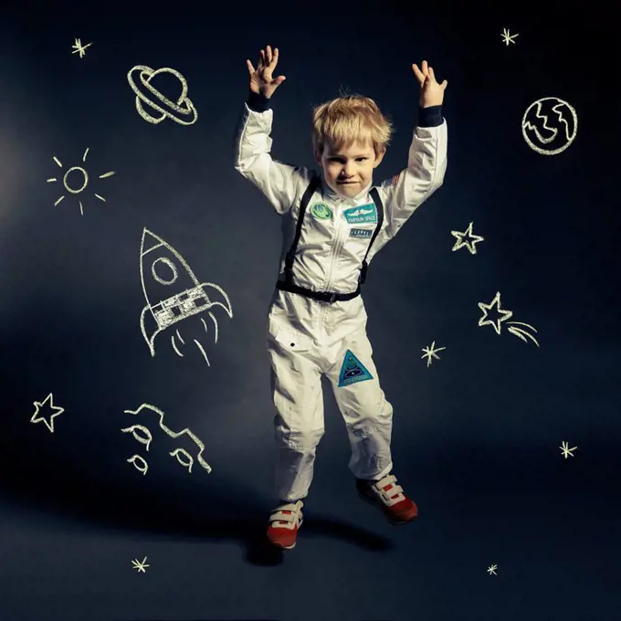 Child with spacesuit orbited by celestial bodies and luminaries