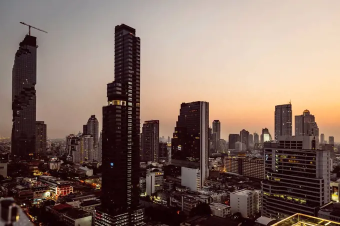Thailand, Bangkok, Skyline with Maha Nakhon Tower in the evening