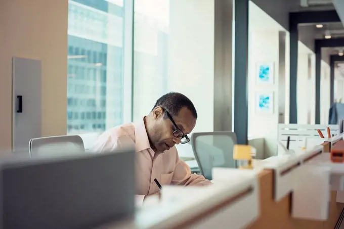 Businessman working alone in office