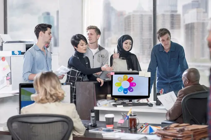 Businesswoman leading informal meeting