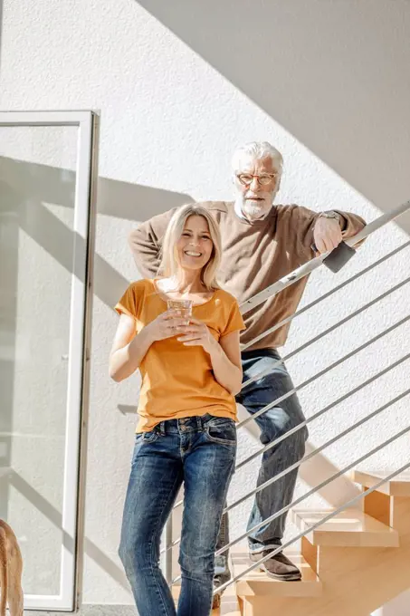 Portrait of smiling couple at home