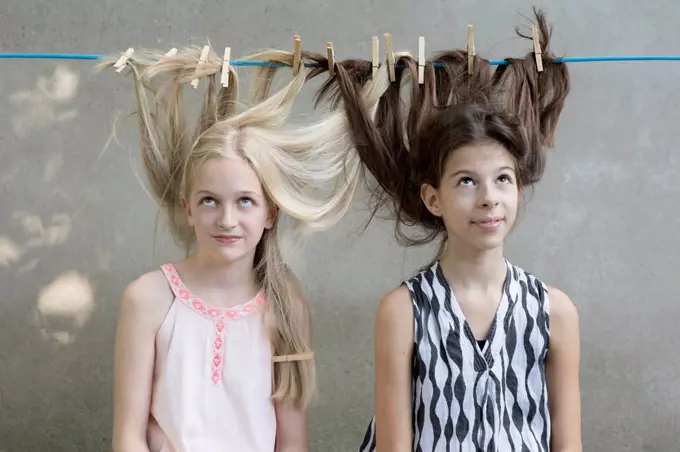 Girls hair drying on clothesline