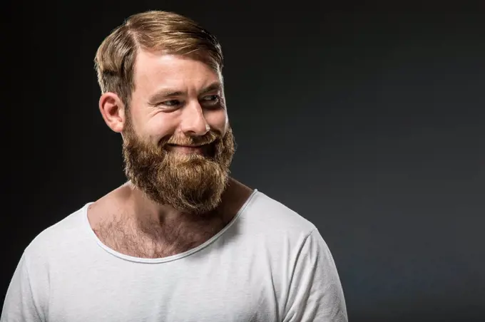 Portrait of smiling man with full beard