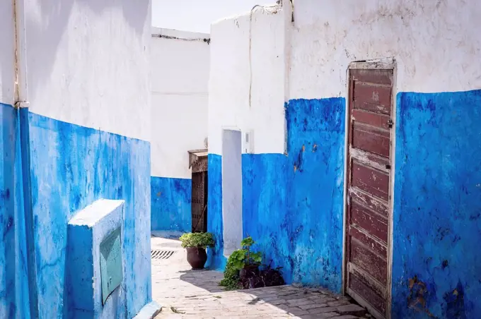 Morocco, alley with blue and white painted walls