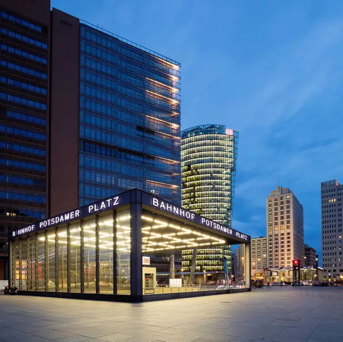 Germany, Berlin, Potsdamer Platz, lighted railway station at twilight