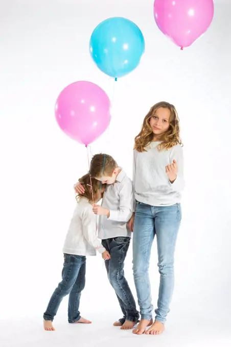 Children playing with balloons