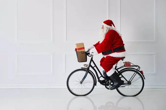 Santa Claus riding a bike