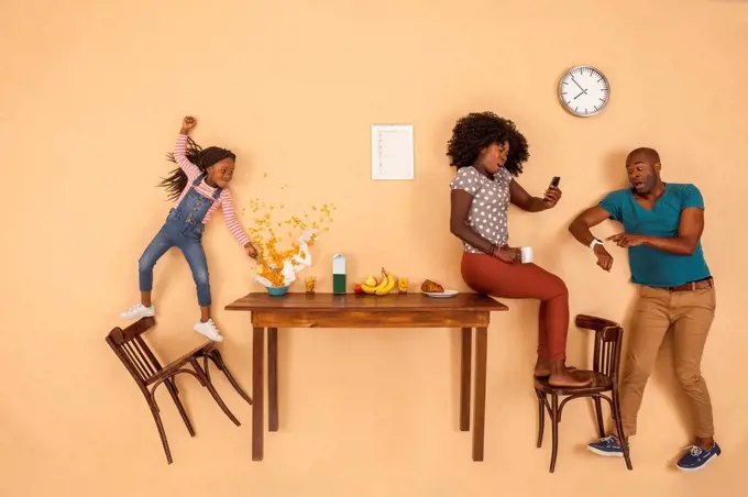 Stressed out family having breakfast in the kitchen