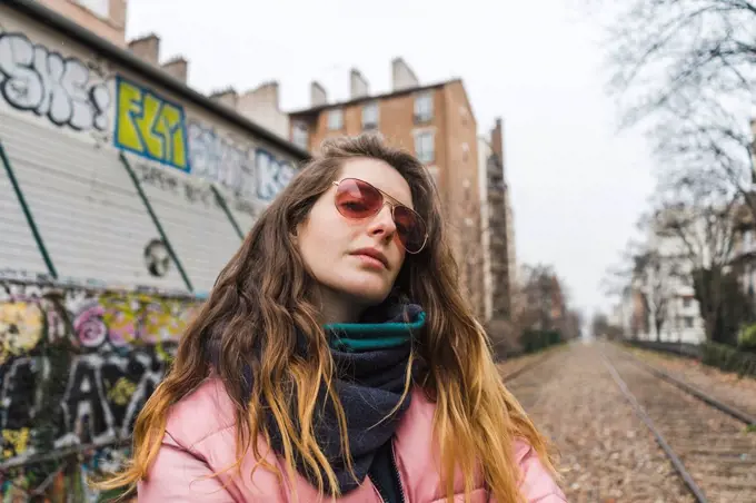 Portrait of young woman wearing sunglasses