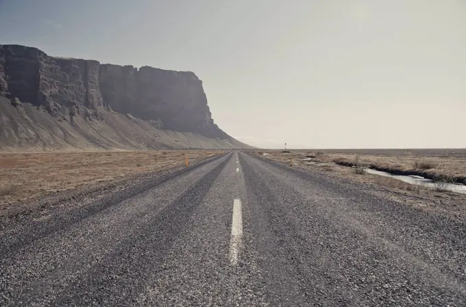 Iceland, South of Iceland, empty gravel road, ring road