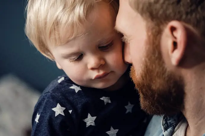 Father spending time with his son at home