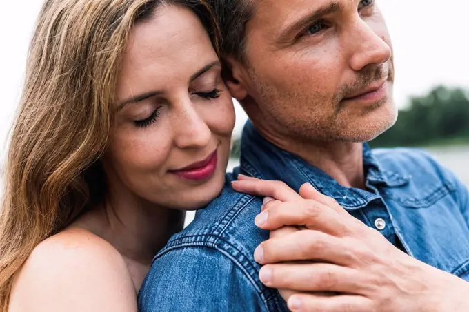 Close-up of affectionate couple outdoors