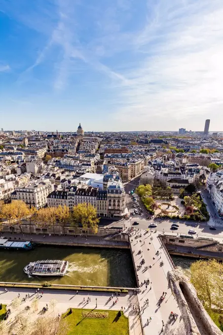 France, Paris, City center with tourist boat on Seine river