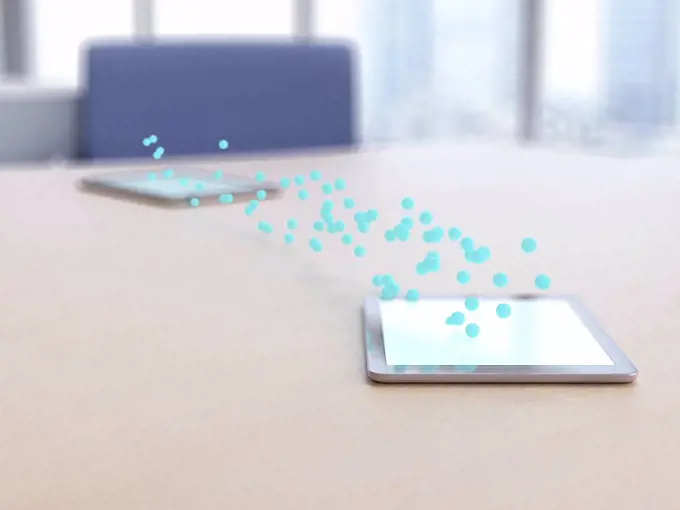 3D rendering, Blue bubbles transferring data from digital tablet