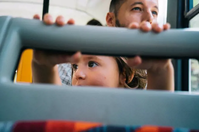 Czechia, Prague, little girl and her father going by bus