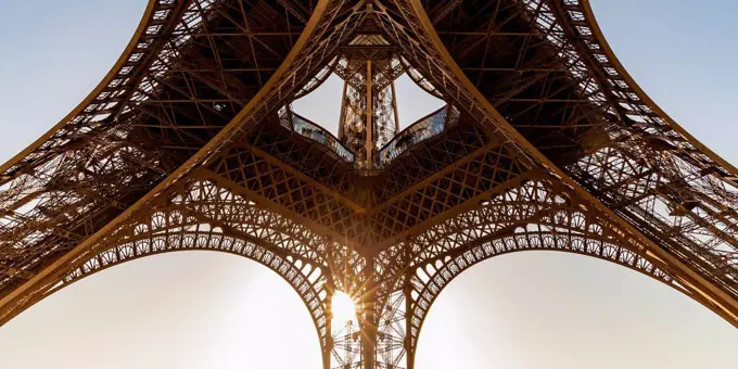 France, Paris, Eiffel Tower, worm's eye view at sunset