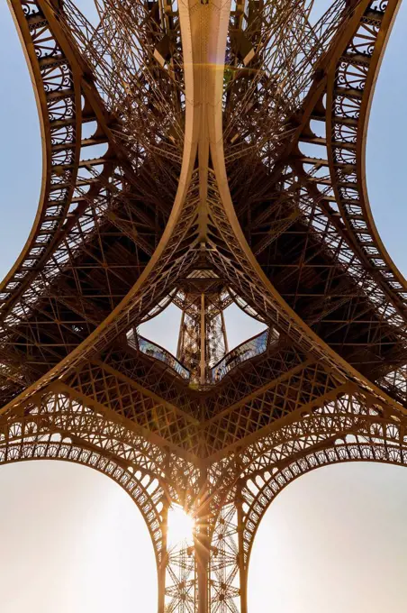 France, Paris, Eiffel Tower, worm's eye view at sunset