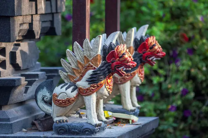 Indonesia, Bali, fierce animal figures at a temple