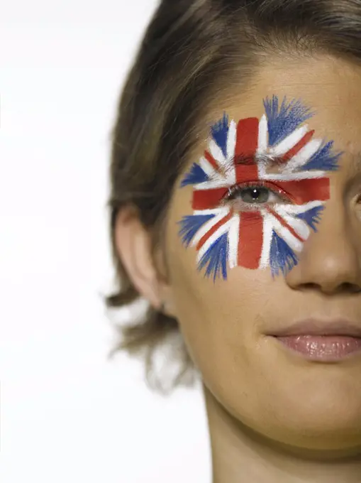 Woman with Union Jack painted on face, portrait