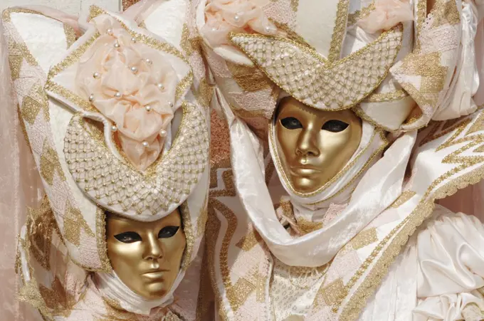 Italy, Venice, masked persons