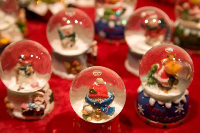 Germany, Baden Württemberg, Esslingen, Christmas snow globes on street stall