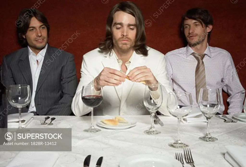 Businessmen in Last Supper Pose   