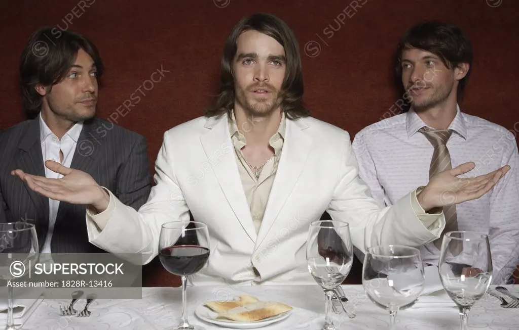 Businessmen in Last Supper Pose   