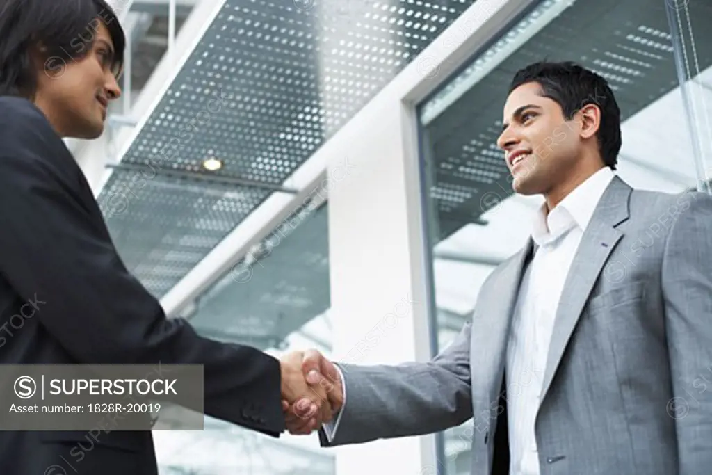 Business People Shaking Hands   