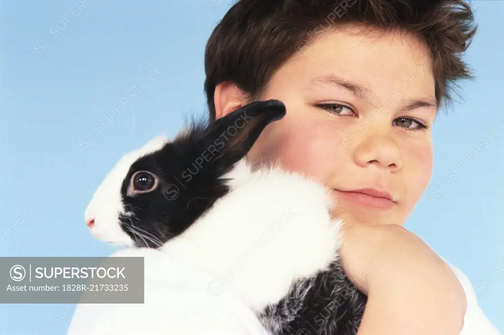 Portrait of Boy with Pet Rabbit   