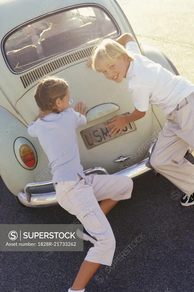 Children Pushing Car   