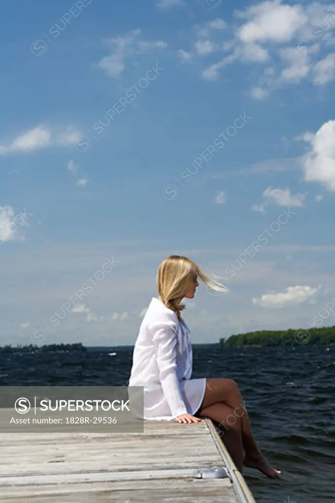 Woman Sitting on Dock   