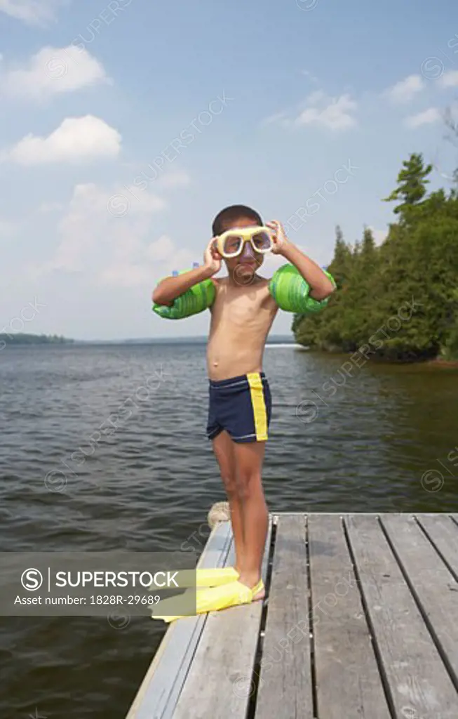 Boy Standing on Dock   