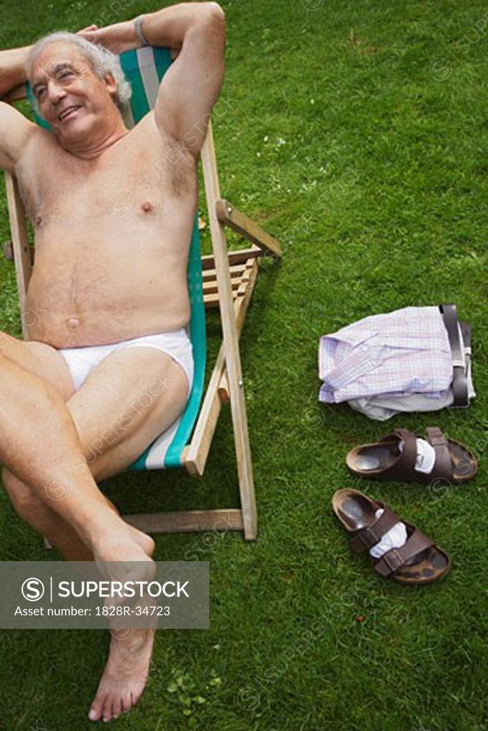 Guy in boxer shorts Stock Photos - Page 1 : Masterfile