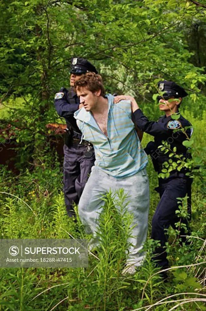 Police Officers Arresting Suspect   