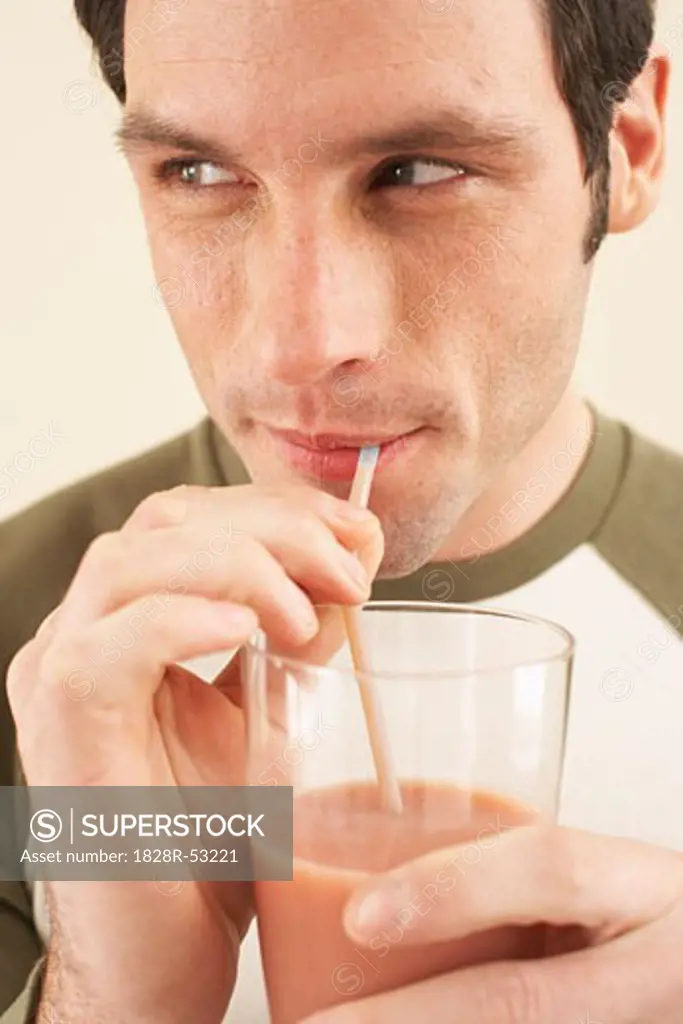 Man Drinking Chocolate Milk   