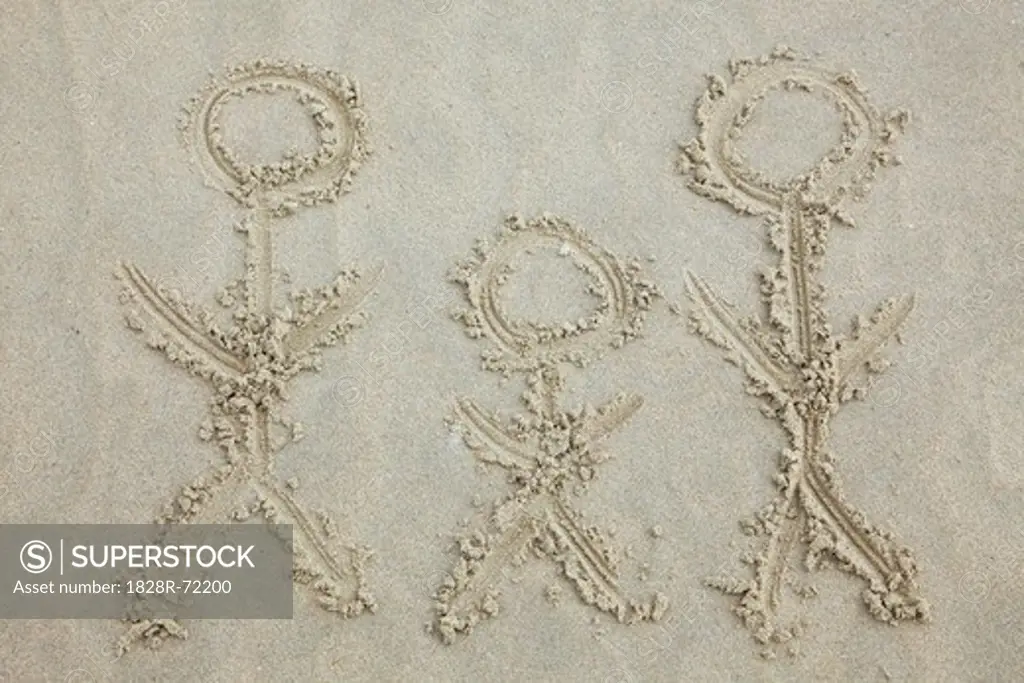 Stick Figure Family Drawing in Sand