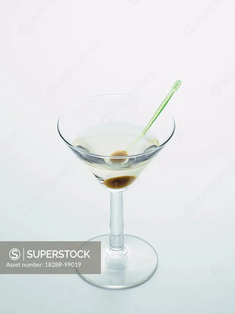 Glass of Martini Bianco with Olive on White Background, Studio Shot.  08/29/2013 - SuperStock