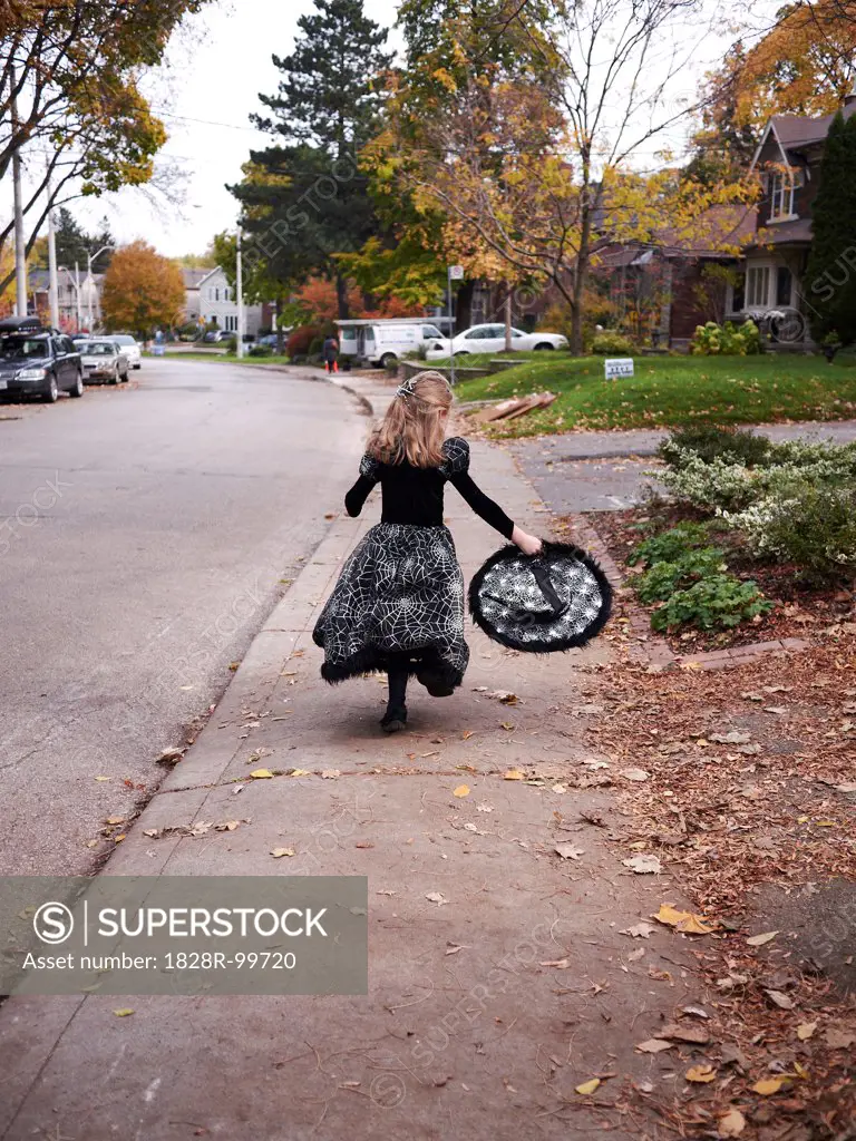 Girl Trick or Treating in Witch Costume, Toronto, Ontario, Canada. 10/31/2011