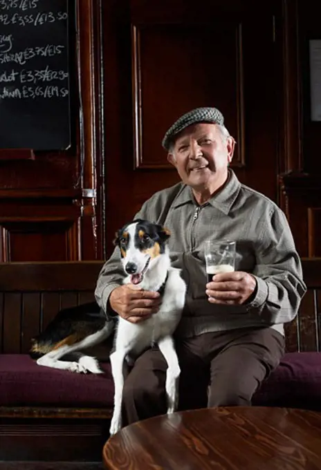 Man With Dog in Pub   