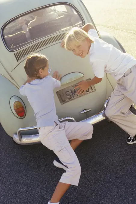 Children Pushing Car   