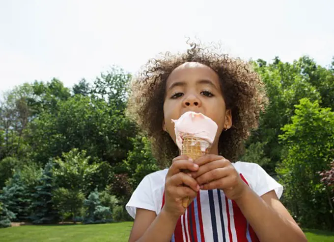 Girl Eating Ice Cream Cone   